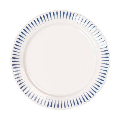 white dinner plate with blue stripes on rim on a white background