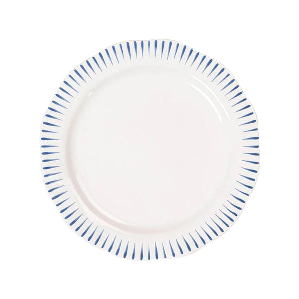 white dinner plate with blue stripes on rim on a white background