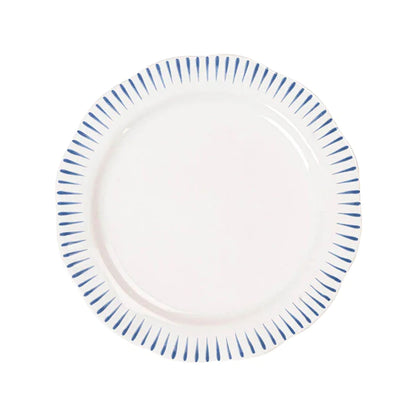 white dinner plate with blue stripes on rim on a white background