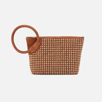 Maggie Clutch with ring handle on a white background.