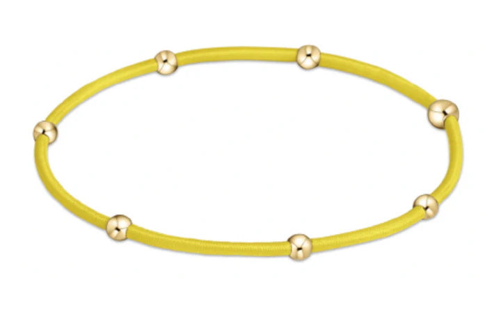 yellow hair tie bracelet with gold beads