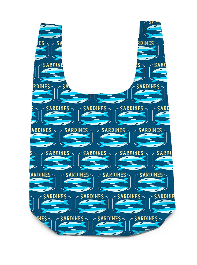 Navy blue shopping bag printed with an all over pattern of sardines and the word sardines