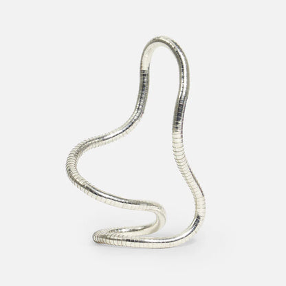 Silver snake-shaped fidget toy on a white background