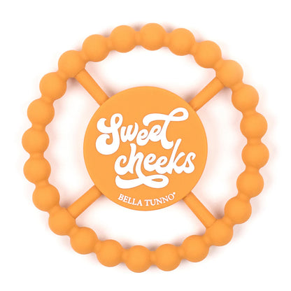 orange silicone teether with sweet cheeks printed in the middle.