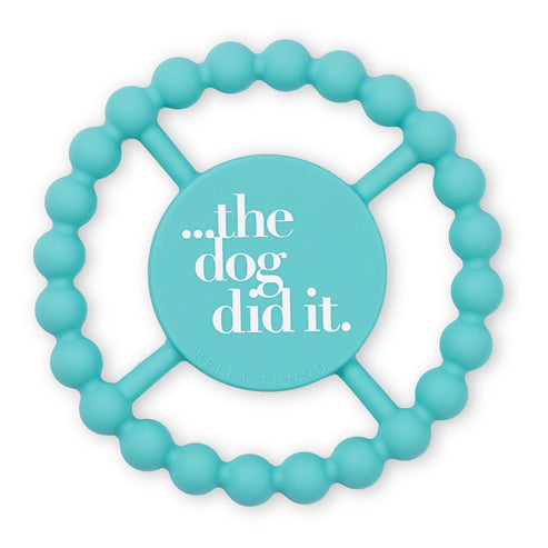 Turquoise silicone teeter with 'the dog did it.' text on it