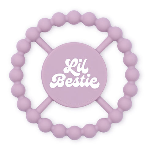 Purple teething ring with 'Lil Bestie' text on it