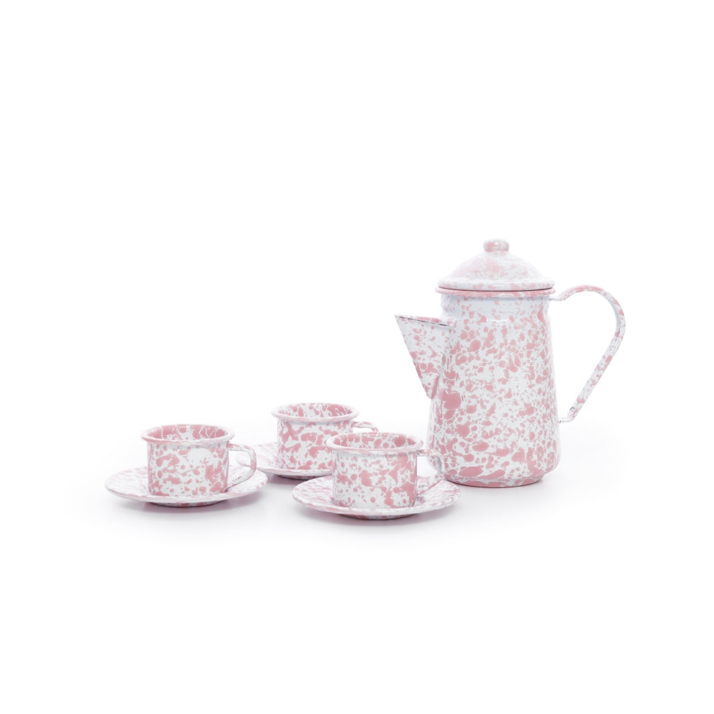 pink splatter ware tea set on a white background.