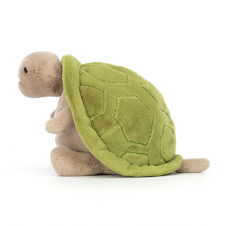 side  view of Timmy Turtle Plush Toy displayed against a white background