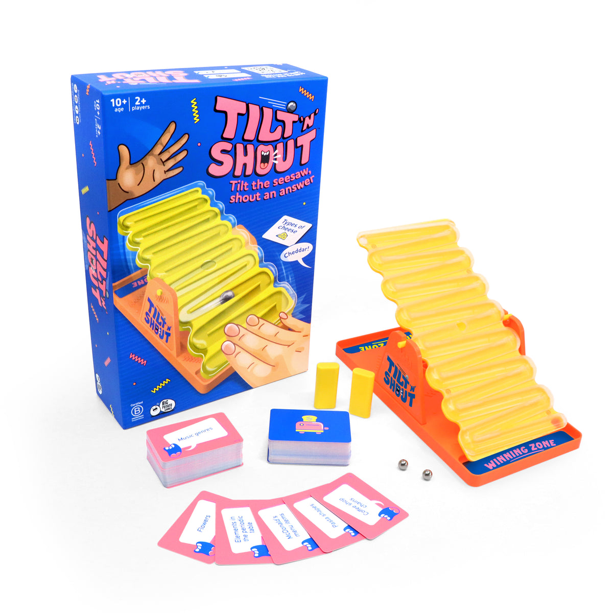 boxed game of Tilt 'n' Shout with the pieces arranged around it shown on a white background