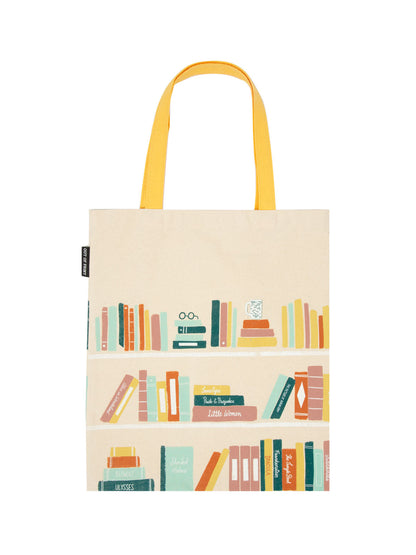 tan tote with yellow handle and sketch of 3 bookshelves with multicolored books