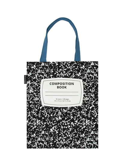 front view of the composition notebook tote bag with blue handles