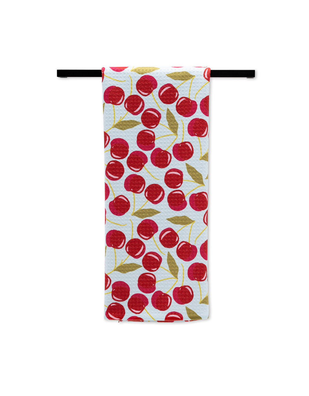 Sweet Cherry Tea Towel folded over a towel bar