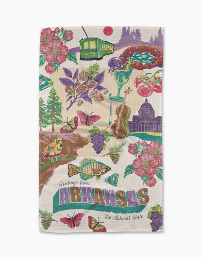 Greetings From Arkansas Tea Towel laying on a white surface