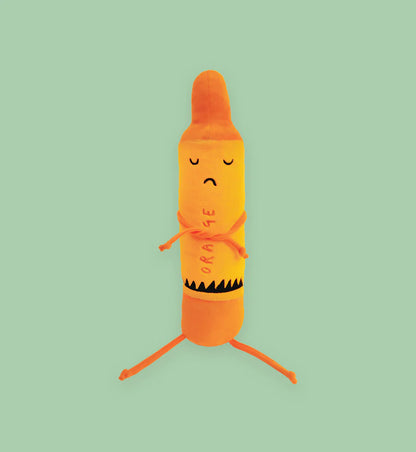 orange crayon doll showing on a green background.