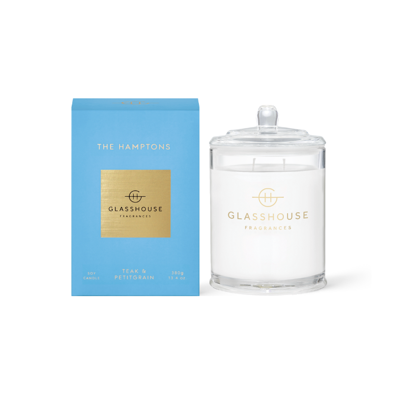 The Hamptons Triple Scented Candle jar displayed next to the blue box against a white background
