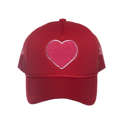 red trucker hat with pink heart on it.