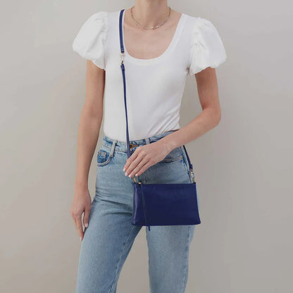 person wearing jeans and white top with WINTER VIOLET Darcy Convertible Crossbody over the shoulder