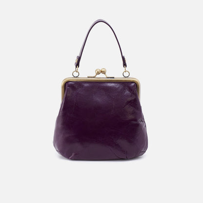 back view of purple alba crossbody on a white background..