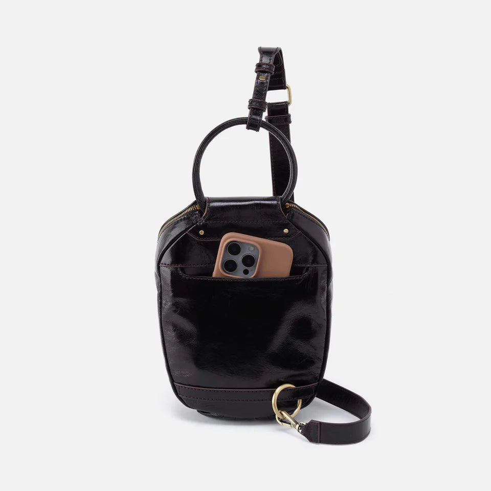 back view of black Sheila Sling Bag with phone in pocket
