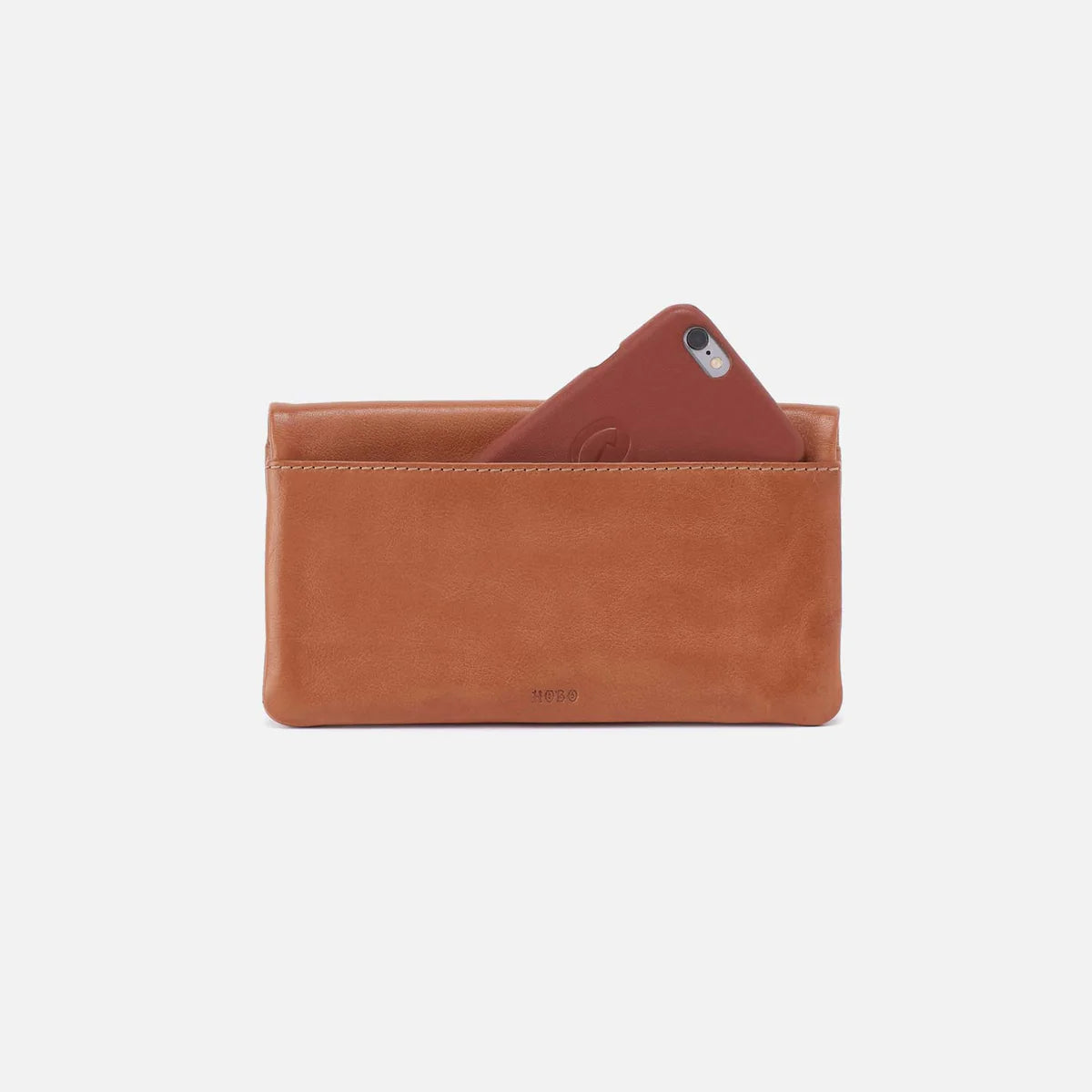 phone coming out of the front of the lumen wallet in the color harvest wheat