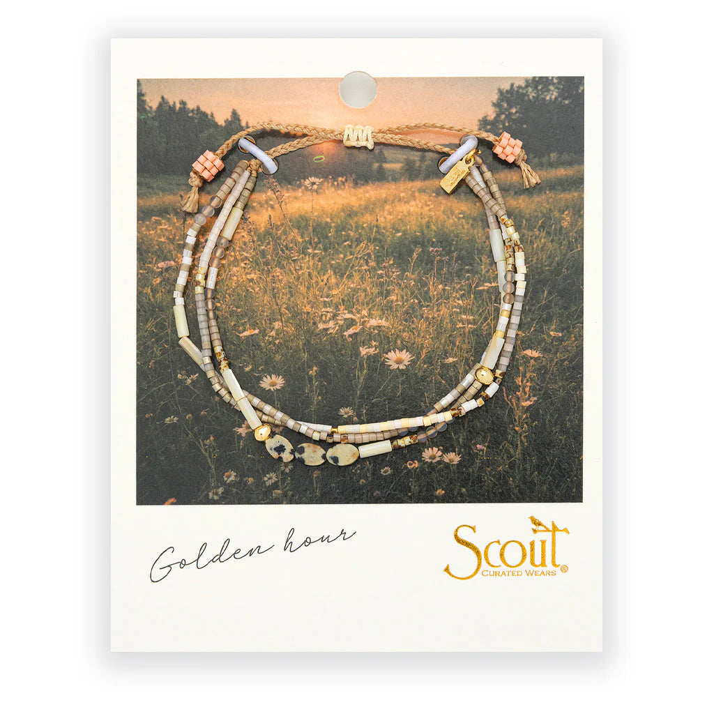 beaded bracelets in earthy brown and white hues on card packaging
