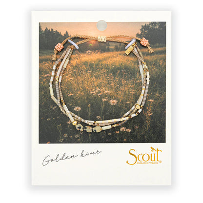 beaded bracelets in earthy brown and white hues on card packaging

