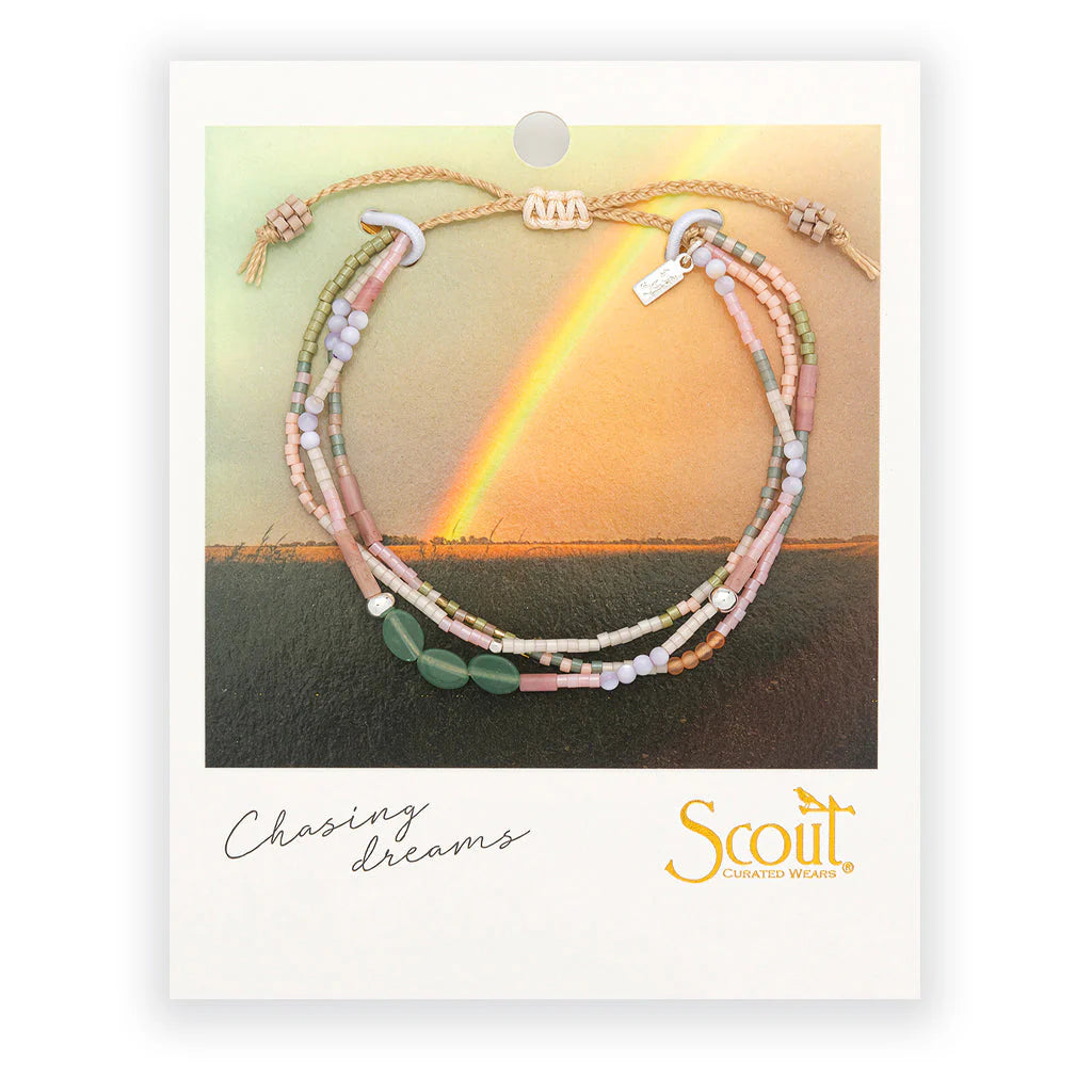 beaded bracelets in earthy hues of pink and green on card packaging