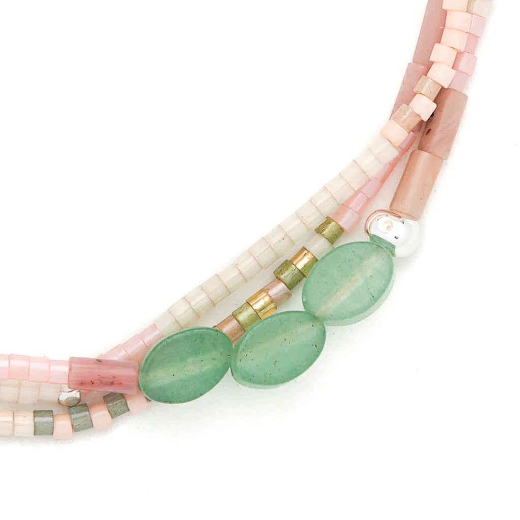 close-up of beaded bracelet on a white background
