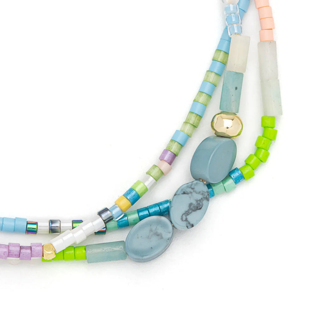 close-up of beaded bracelet on a white background