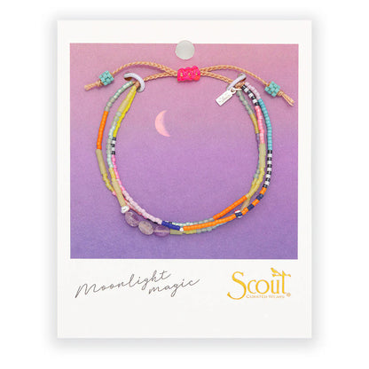 beaded bracelets in a rainbow of hues hues on card packaging