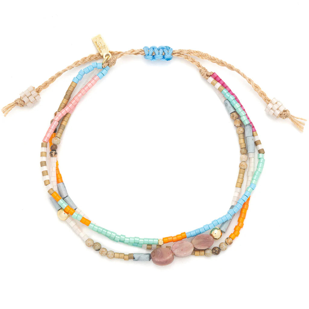 beaded bracelets in vibrant colorful hues hues shown on a white background