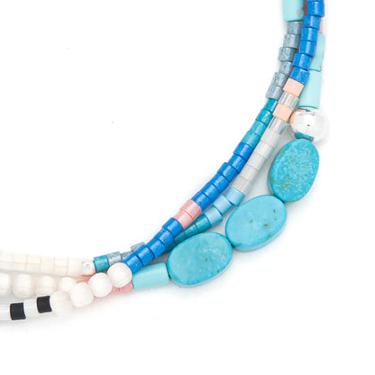 close-up of beaded bracelet on a white background
