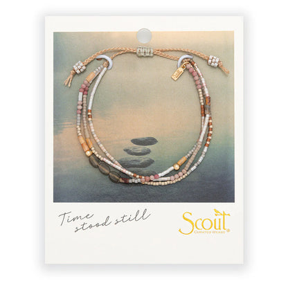 beaded bracelets in earthy brown and pink hues on card packaging