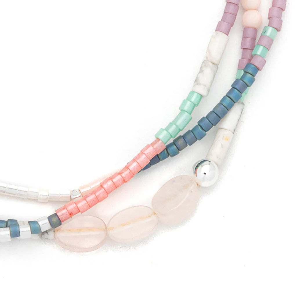close-up of beaded bracelet on a white background