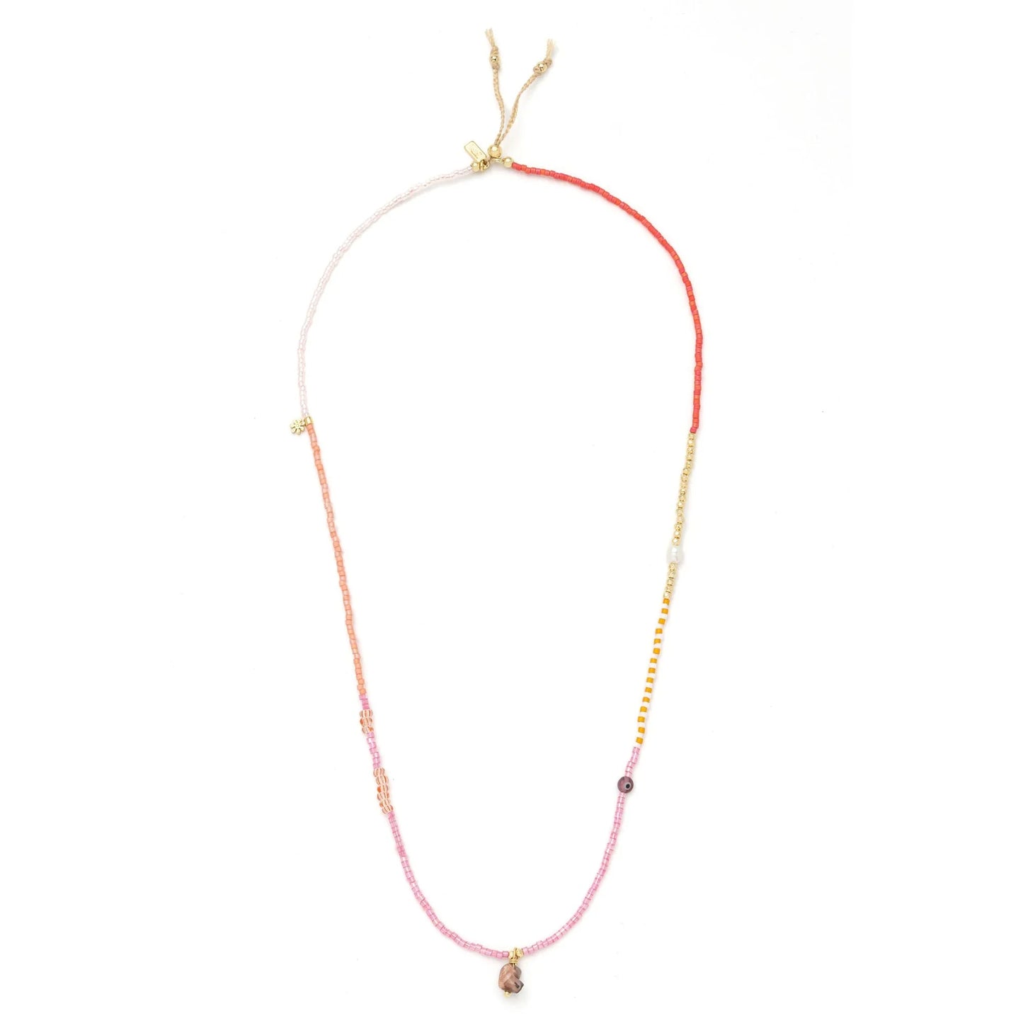 beaded wrap in pink and gold hues shown laying as a necklace on a white background
