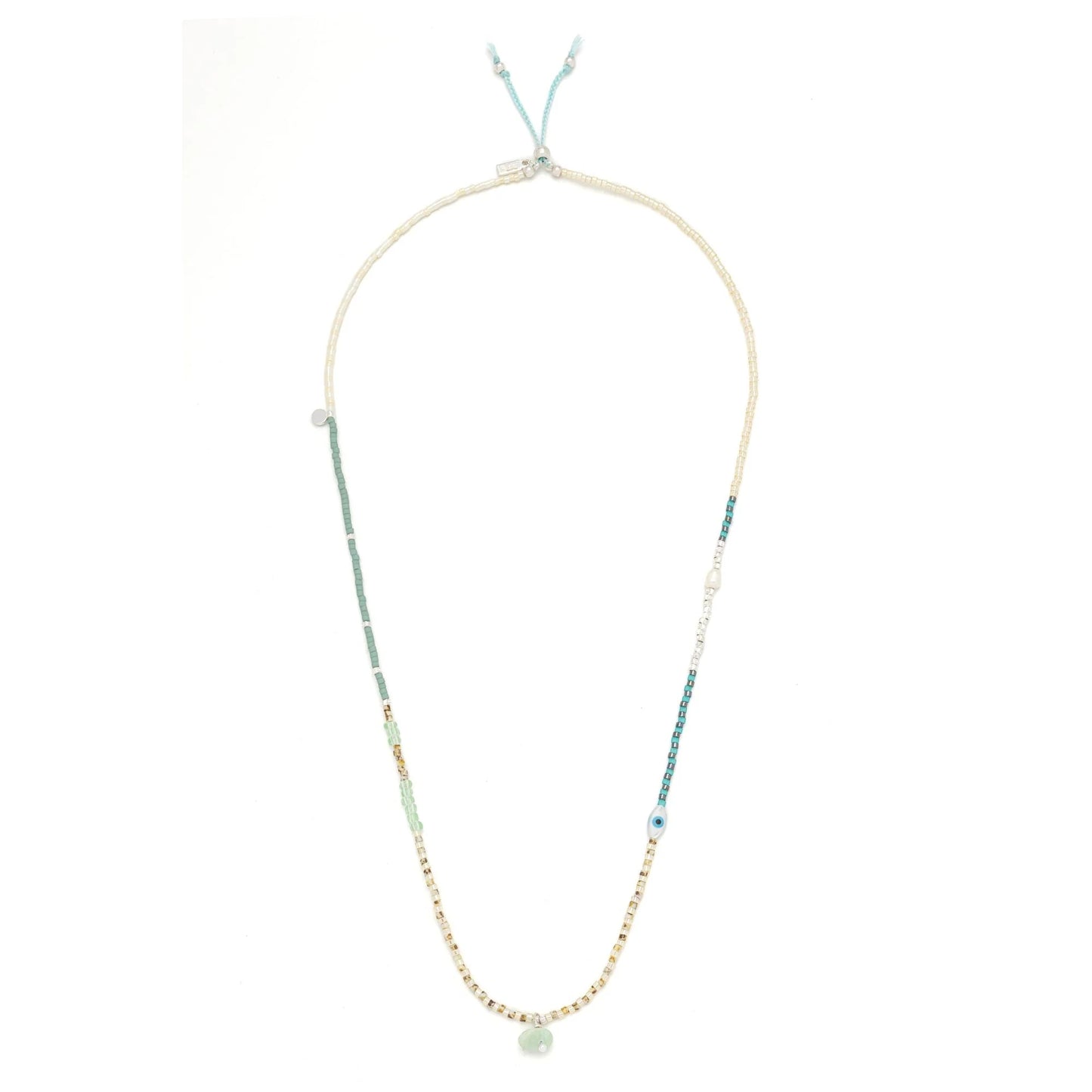 beaded wrap in dreamy green hues shown laying as a necklace on a white background

