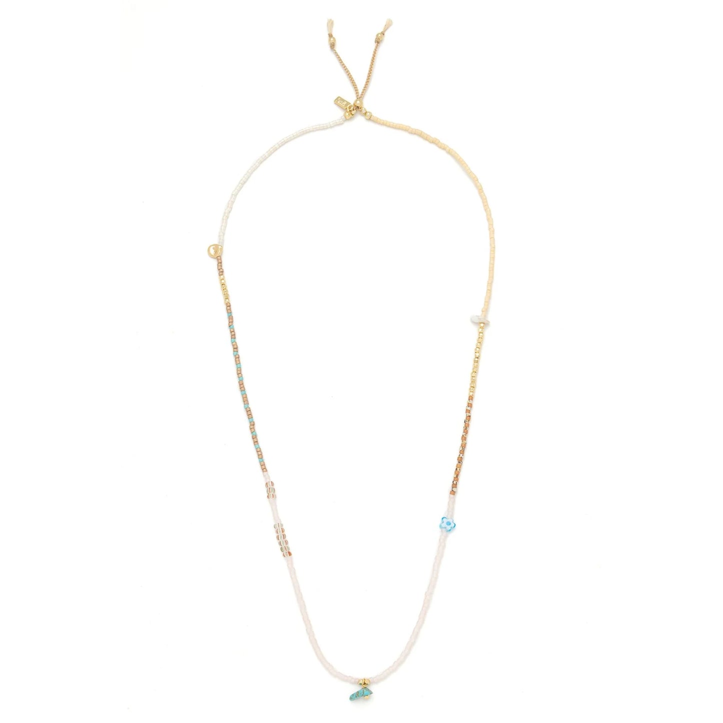 beaded wrap in blush pink and gold hues shown laying as a necklace on a white background
