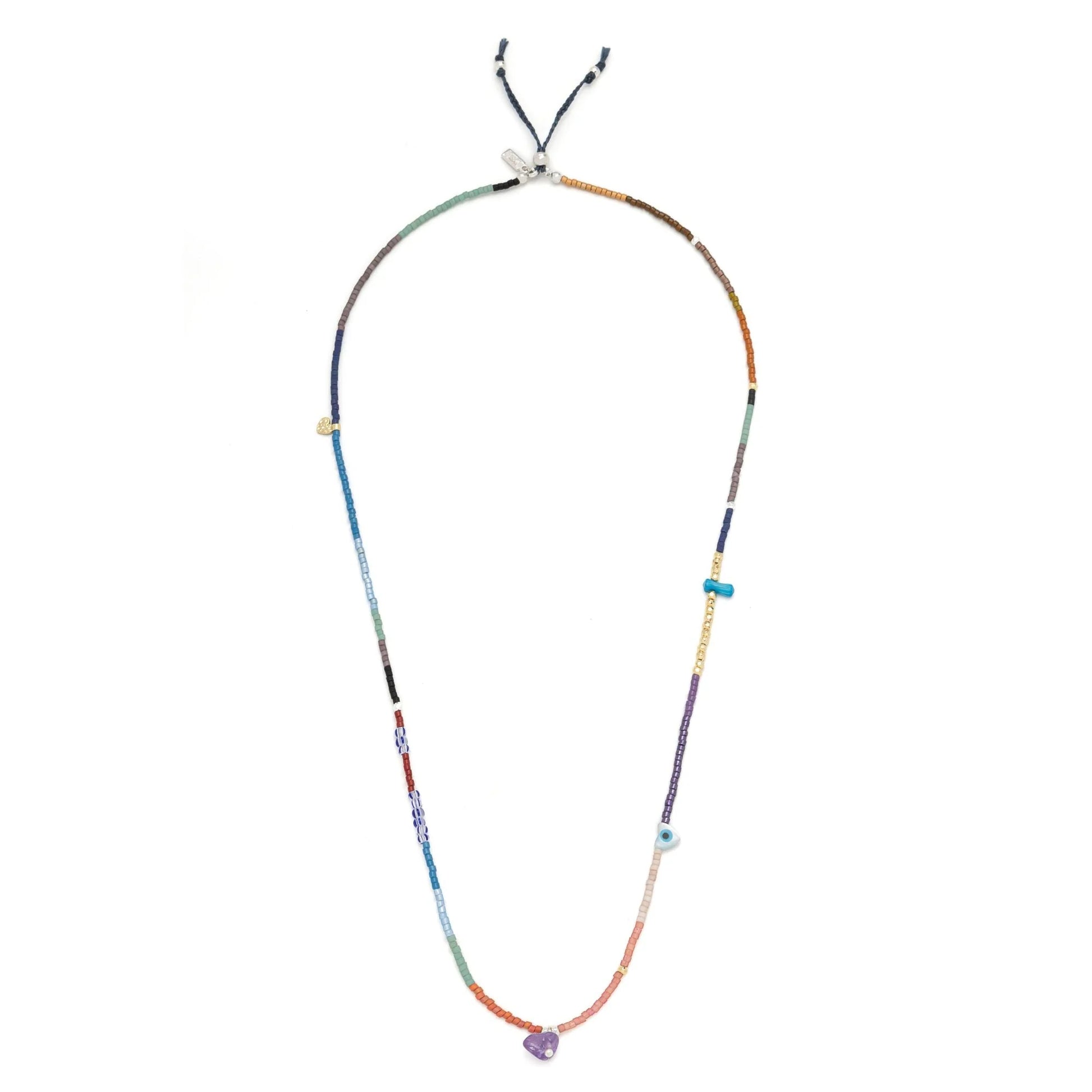 beaded wrap in a rainbow of hues shown laying as a necklace on a white background
