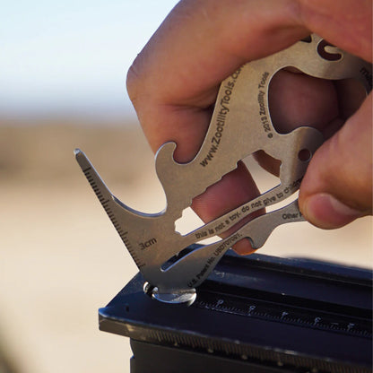 PocketMonkey tool being used as a screwdriver