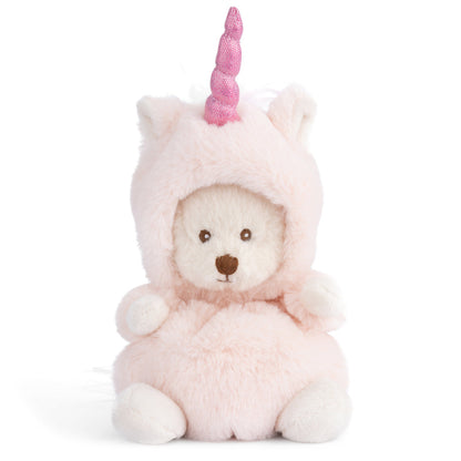 Plush toy bear in a unicorn costume with a pink horn on a white background