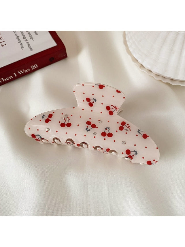 Cherries & Rhinestones Claw Clip on desk