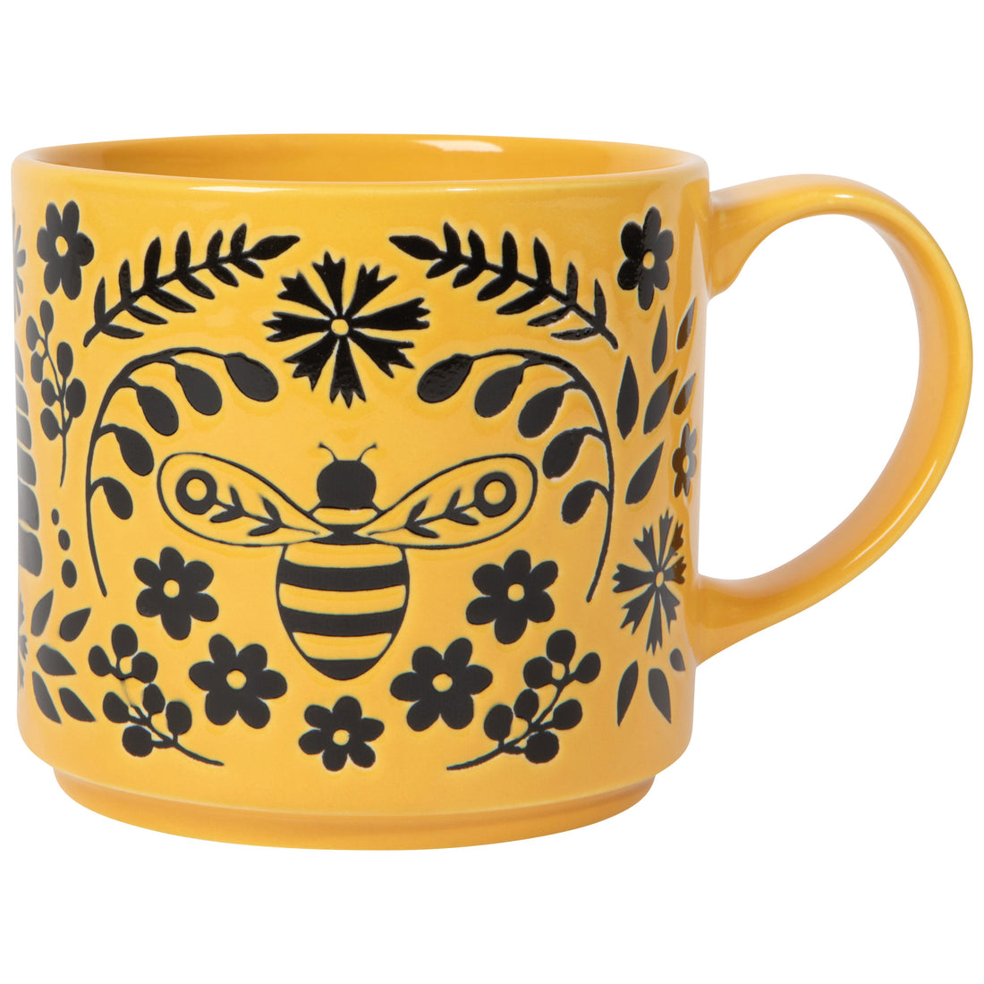 yellow mug with black images of flowers, hives, and bees