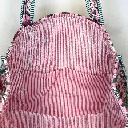 interior view of tote bag showing pink and white striped interior