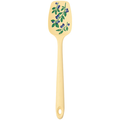 light yellow silicone spoonula with blueberry spring on it