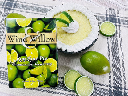  Key Lime Cheeseball & Dessert Mix set next to a  Key Lime pie