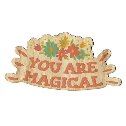 pink text "you are magical" with multicolored flowers above text