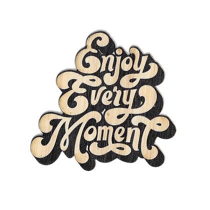 "enjoy every moment" text in a natural wood colored text with black shadow
