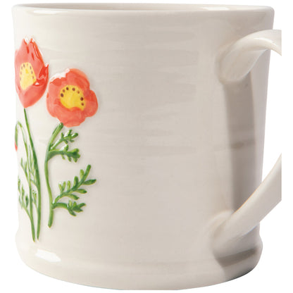 side view of the poppy embossed mug