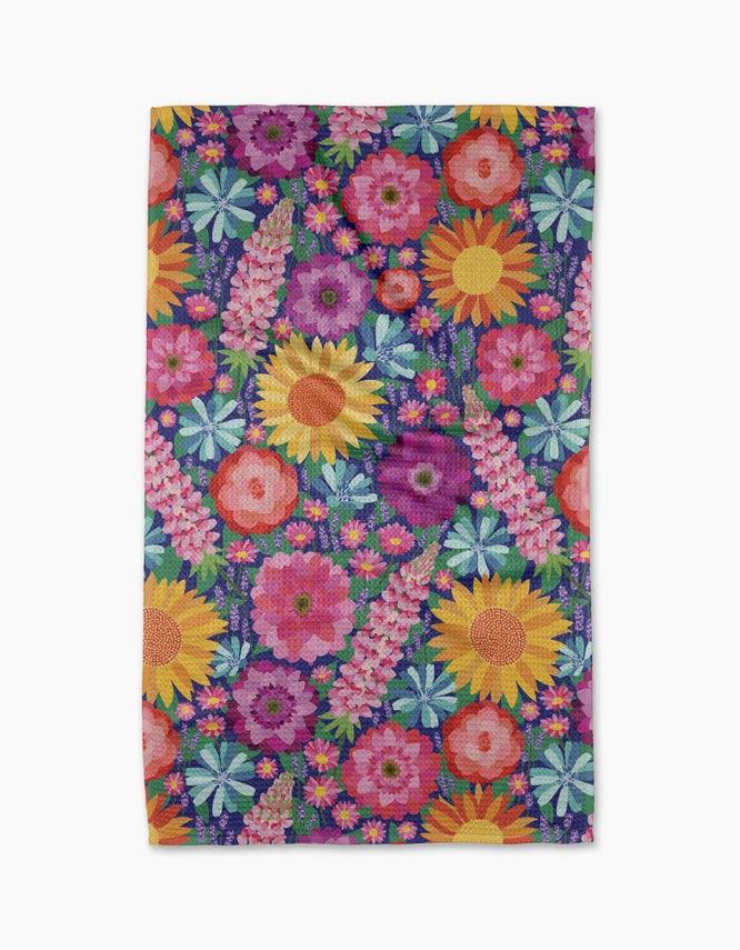multicolored towel filled with multicolored different flowers