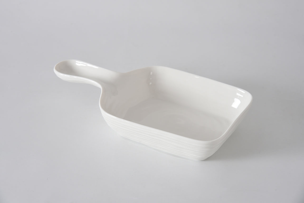 organic shaped white serving dish with handle